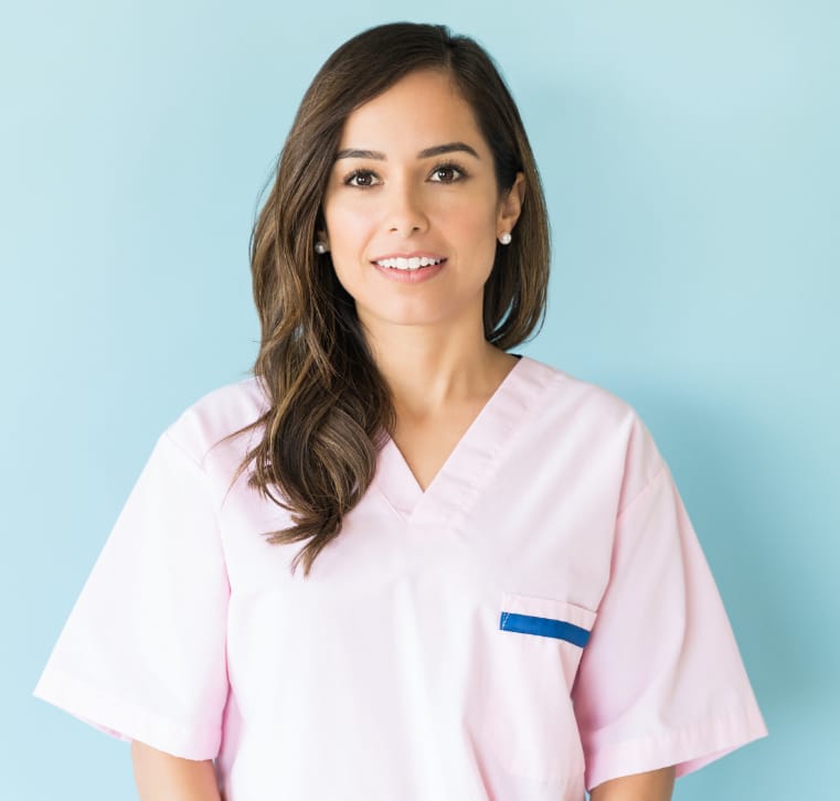 headshot of nurse in pink scrubs